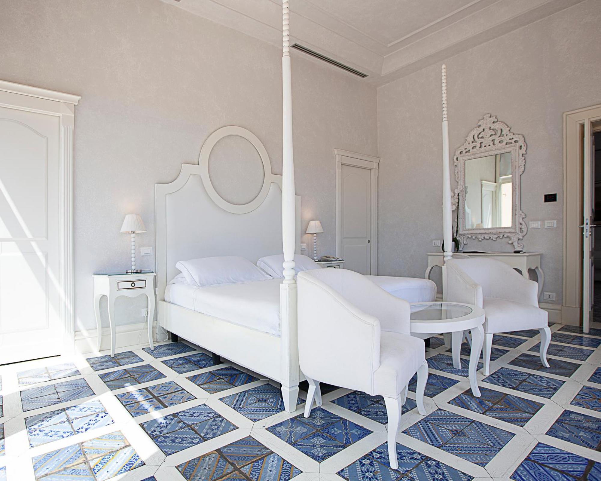 Villa Athena Resort Αγκριτζέντο Δωμάτιο φωτογραφία A bedroom at the hotel